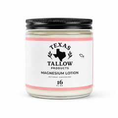 A glass jar lotion with a black metal lid and a white label reading 'Texas Tallow Products Magnesium Lotion' on a clean white background.